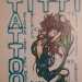 ...cos, essendo unartista, decisi di provare a coniugare i disegni sulla tela a quelli sul corpo. Iniziai a studiare e aprii il primo laboratorio in piazza Eroi del Mare, sul lungomare di Bari. Il logo del mio studio, che si chiamava TittiTattoo, era una sirena circondata da onde e delfini